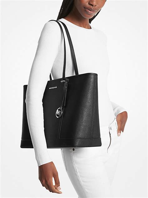 michael kors jet set travel east west pebble leather tote|black saffiano leather tote.